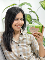 Load image into Gallery viewer, Lieve Care Aloe Vera Cucumber Facial Wipes in a woman's hand for refreshing skin care
